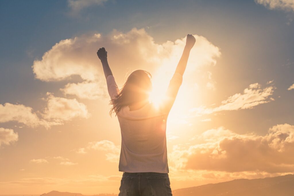 woman celebrating the sun